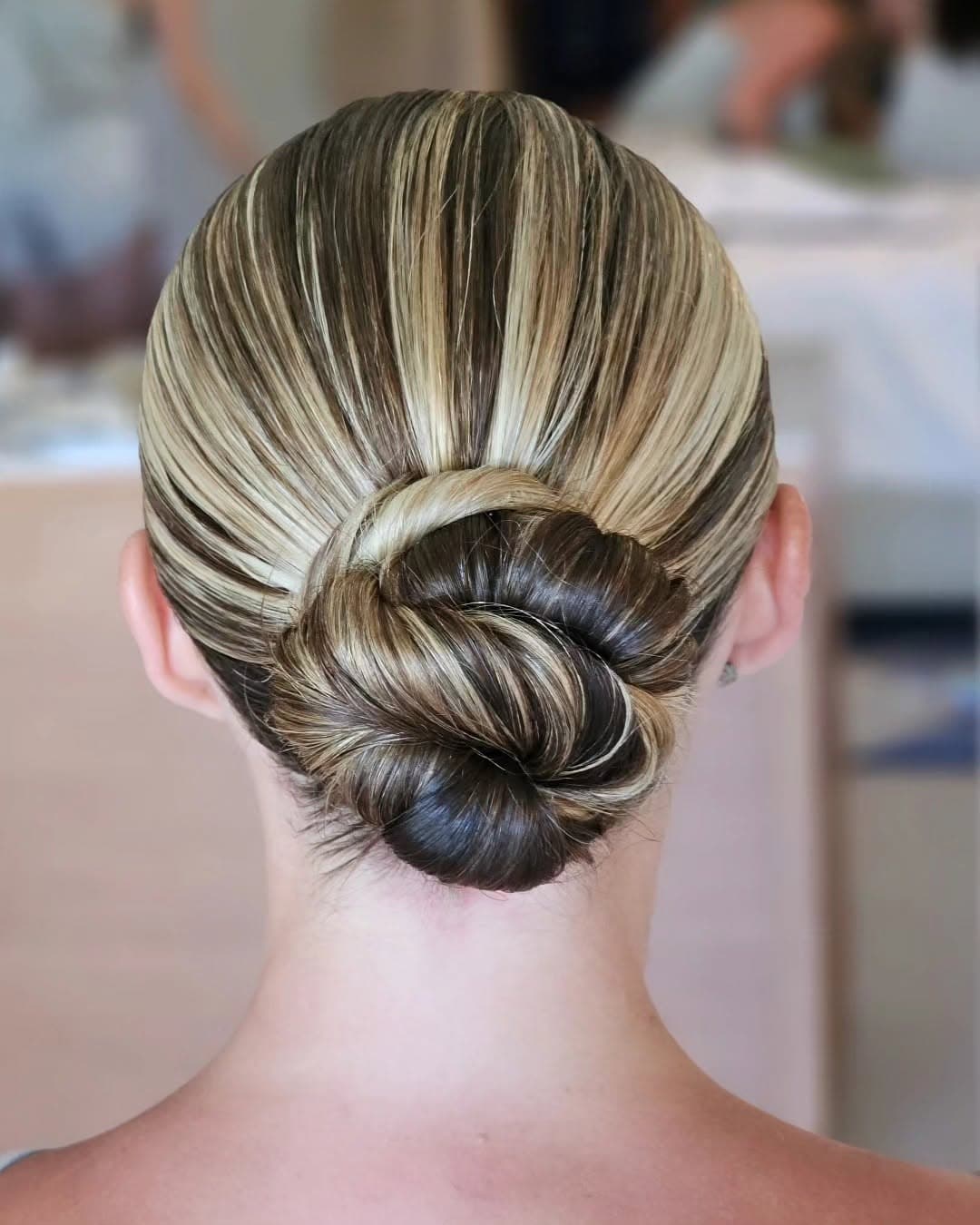 Sleek bridal low bun